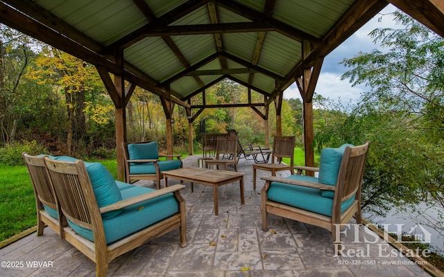 view of patio featuring a gazebo and an outdoor living space