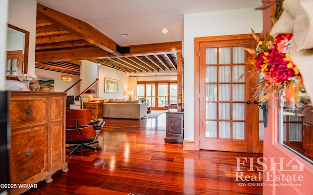 hallway with beam ceiling, wood-type flooring, and french doors