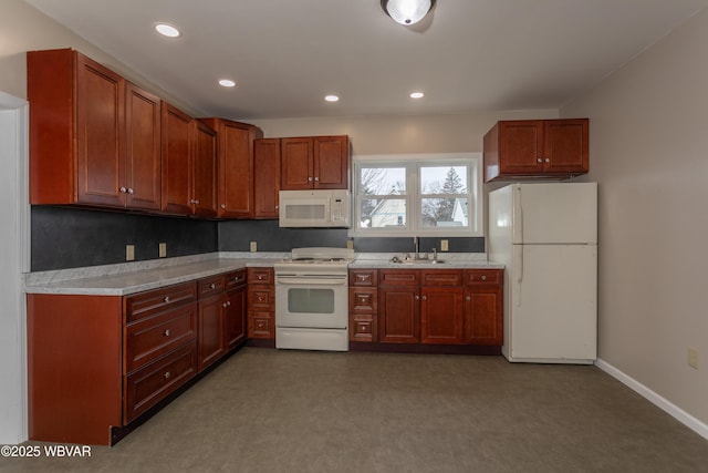 kitchen with sink and white appliances