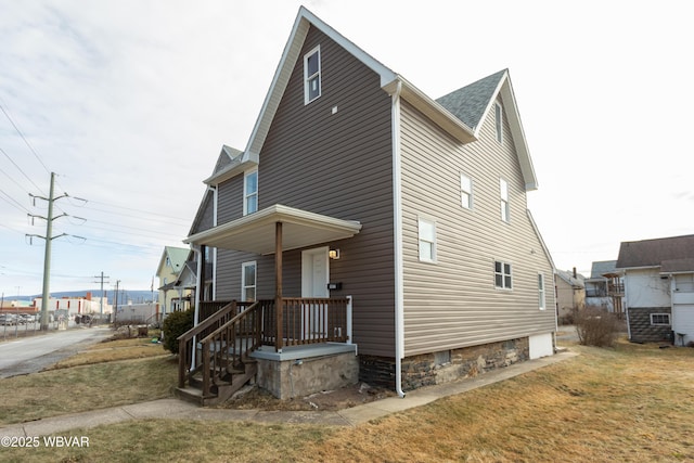 exterior space featuring a front lawn