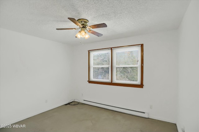 carpeted spare room with ceiling fan, a textured ceiling, and a baseboard radiator