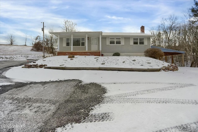 view of front facade featuring a carport