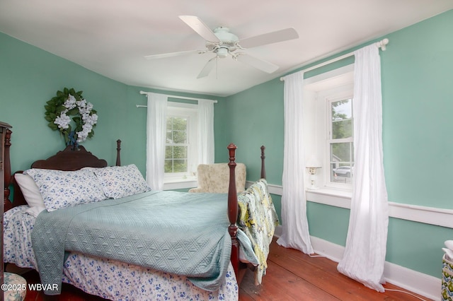 320 Carpenters Ln, Pennsdale, PA 17756 - bedroom featuring hardwood / wood-style flooring, baseboards, and ceiling fan