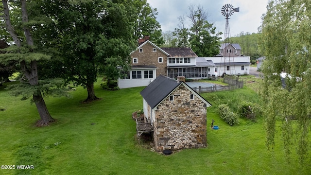 320 Carpenters Ln, Pennsdale, PA 17756 - back of house featuring a chimney and stone siding
