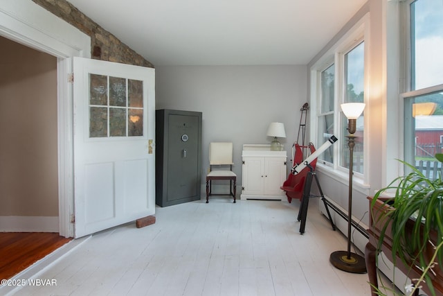 320 Carpenters Ln, Pennsdale, PA 17756 - sunroom with a baseboard radiator and lofted ceiling