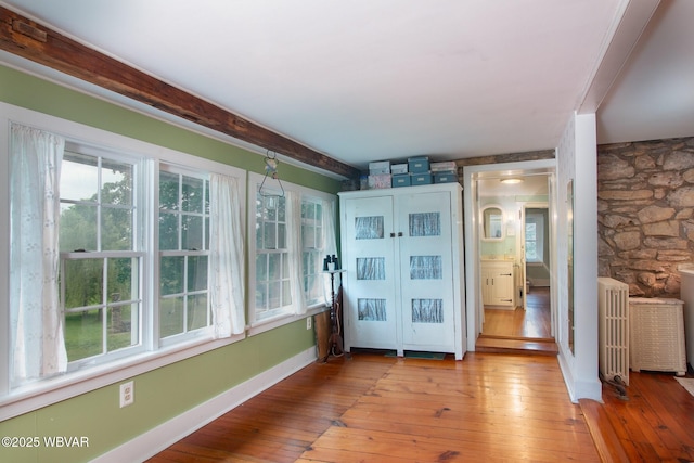 320 Carpenters Ln, Pennsdale, PA 17756 - entryway with wood-type flooring, radiator, baseboards, and beam ceiling