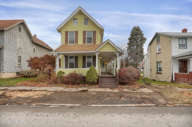 view of front property with covered porch