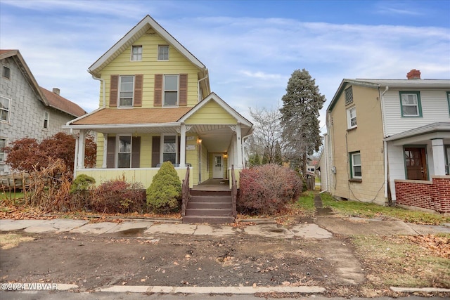 view of front property with covered porch