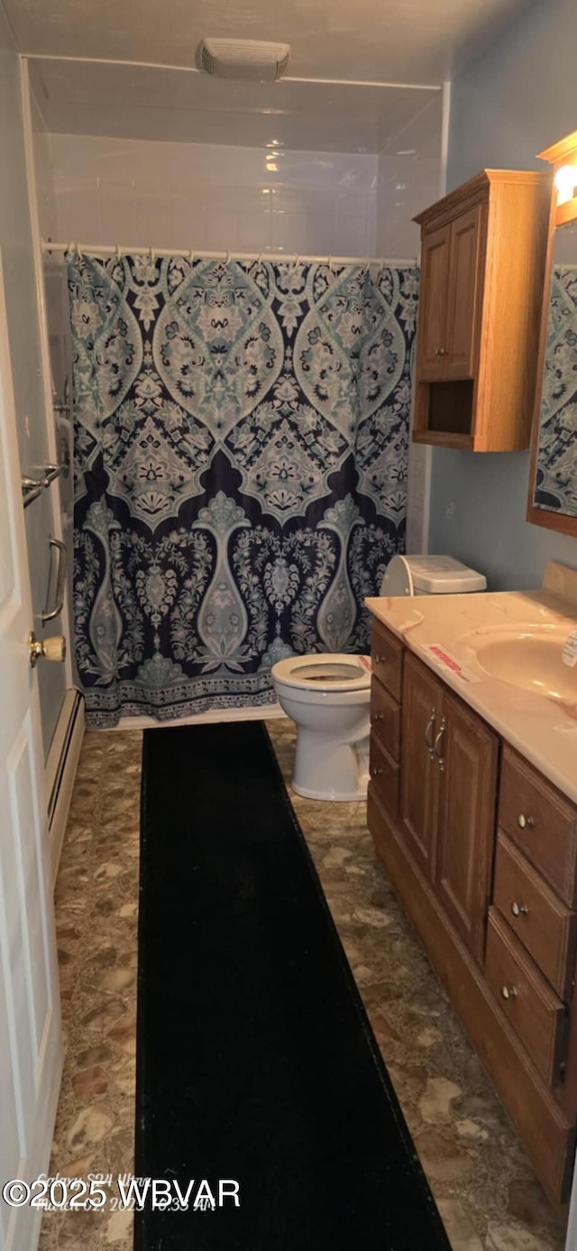 bathroom featuring vanity, curtained shower, toilet, and baseboard heating