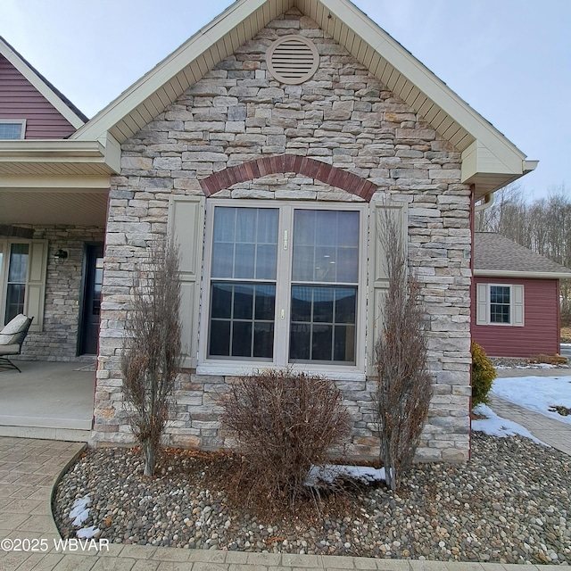 view of property exterior featuring stone siding