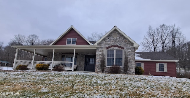 view of front facade with stone siding and a porch