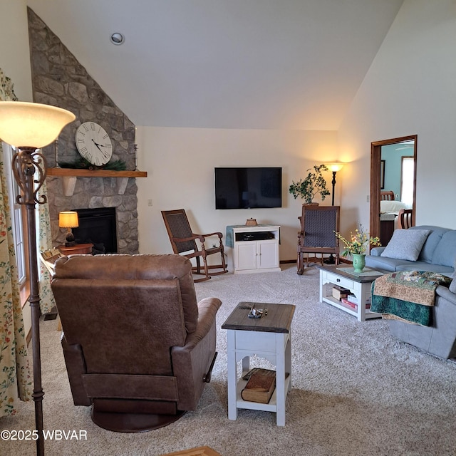 living room featuring a stone fireplace, carpet, and high vaulted ceiling