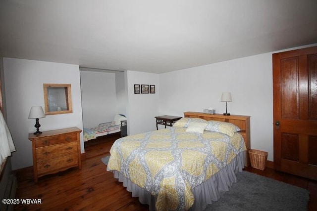 bedroom featuring dark hardwood / wood-style floors