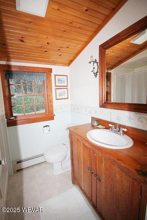 bathroom with vaulted ceiling, a baseboard radiator, vanity, wood ceiling, and toilet