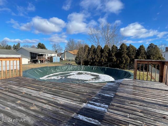 view of pool featuring a deck