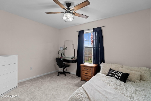 bedroom with baseboards, light colored carpet, and ceiling fan
