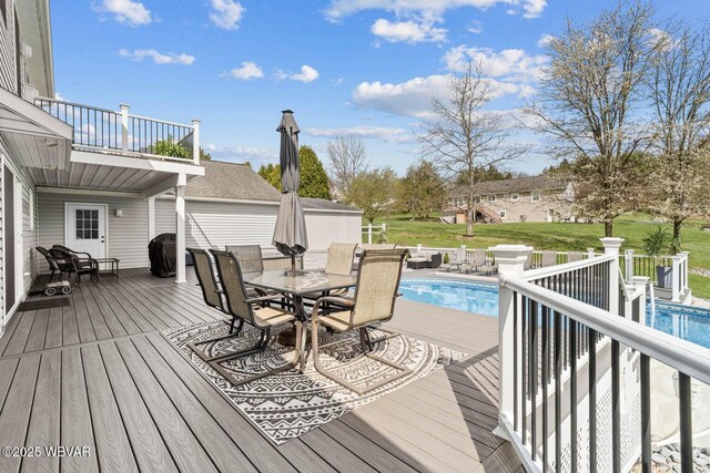 deck featuring outdoor dining area
