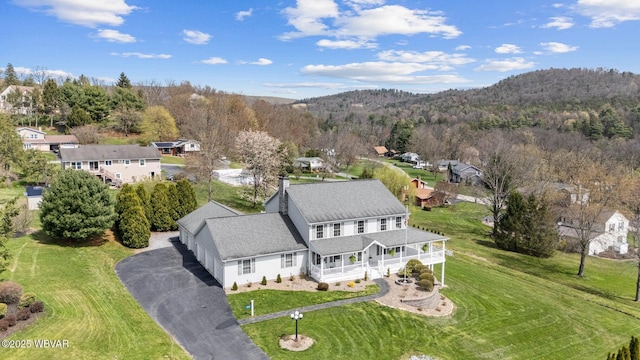 view from above of property featuring a mountain backdrop