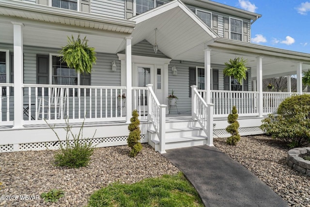 doorway to property featuring a porch