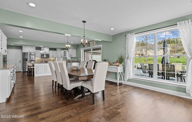 dining area featuring a chandelier, dark wood-style floors, recessed lighting, and baseboards