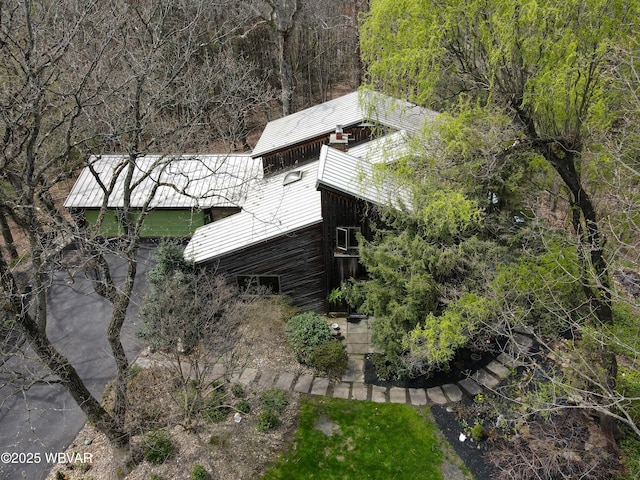 exterior space with a forest view
