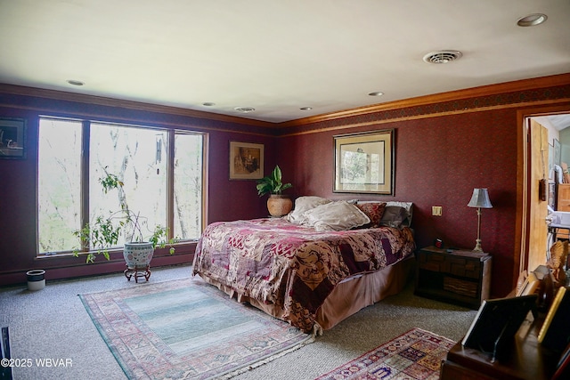 carpeted bedroom with recessed lighting, visible vents, and ornamental molding