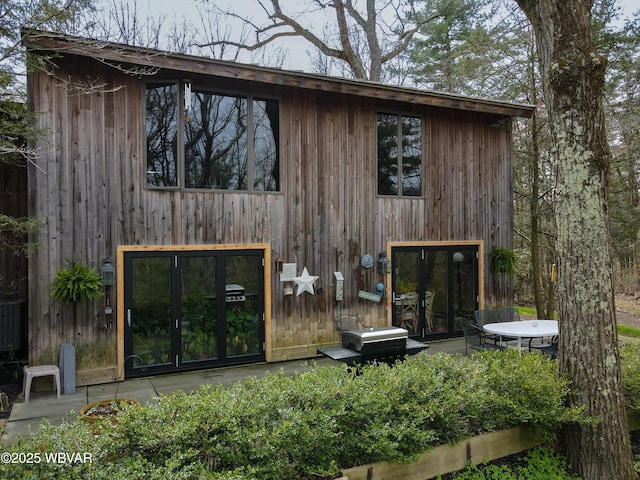 view of outdoor structure with french doors