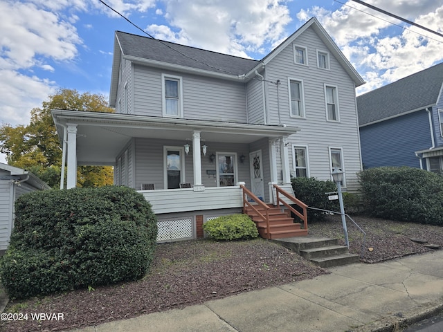 view of property with covered porch