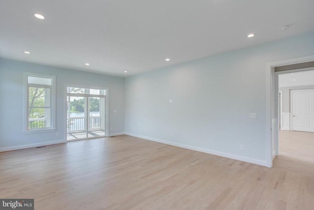 empty room featuring light hardwood / wood-style floors