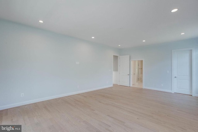 unfurnished room featuring light wood-type flooring