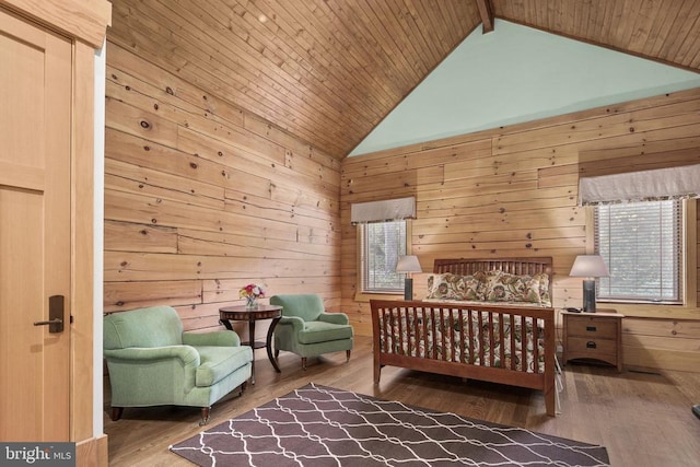 bedroom with high vaulted ceiling, wood walls, dark hardwood / wood-style floors, and wood ceiling