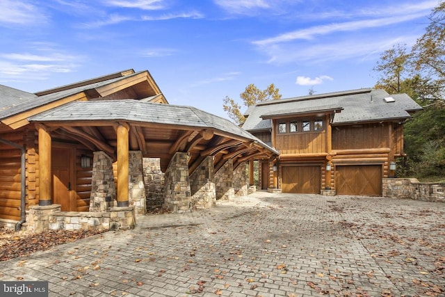 log home with a garage