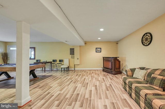 living room with billiards and light wood-type flooring