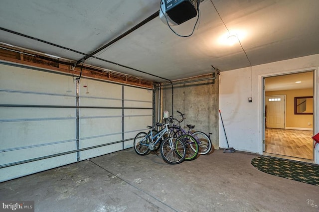 garage featuring a garage door opener