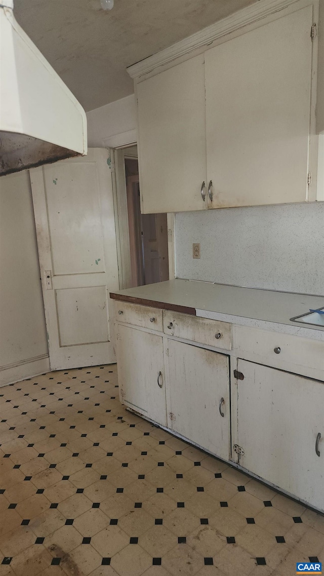 kitchen with white cabinetry