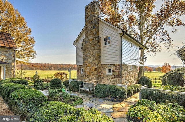 exterior space featuring a rural view