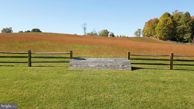 view of gate featuring a rural view