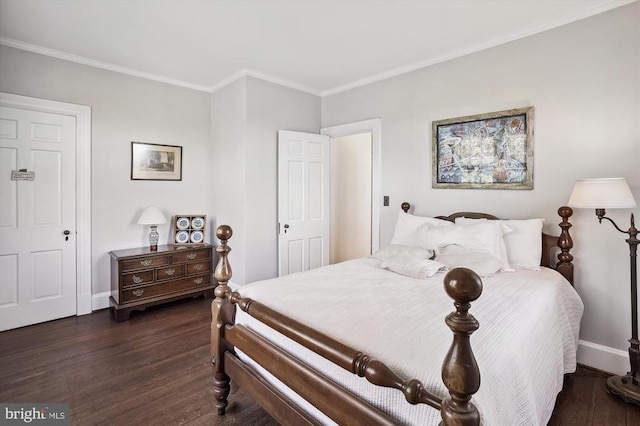 bedroom featuring dark wood-type flooring and crown molding