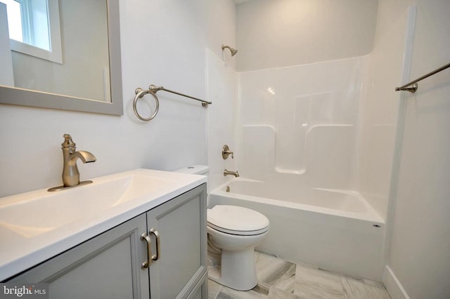 full bathroom featuring washtub / shower combination, oversized vanity, toilet, and tile flooring