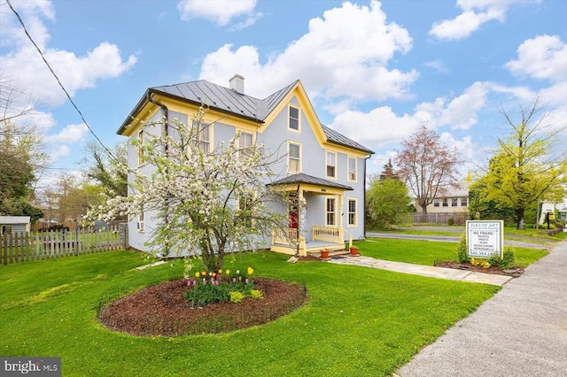 view of front of home with a front yard