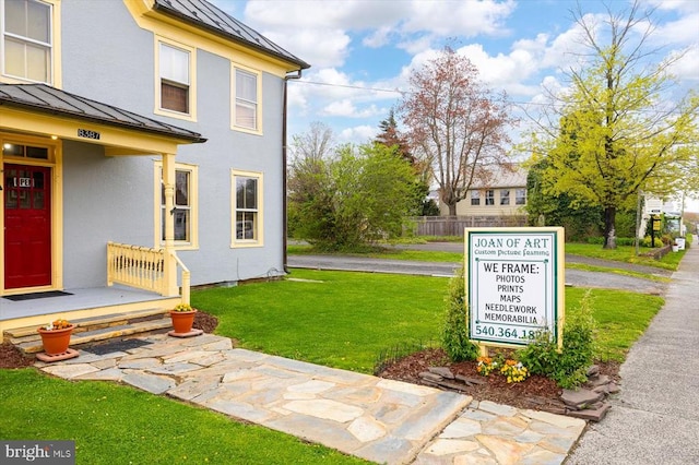 exterior space with a lawn