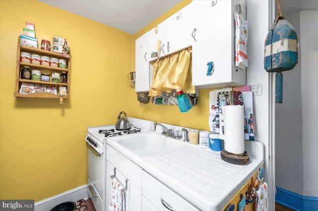 laundry area featuring sink