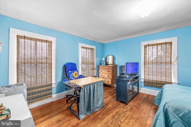 home office featuring dark hardwood / wood-style flooring