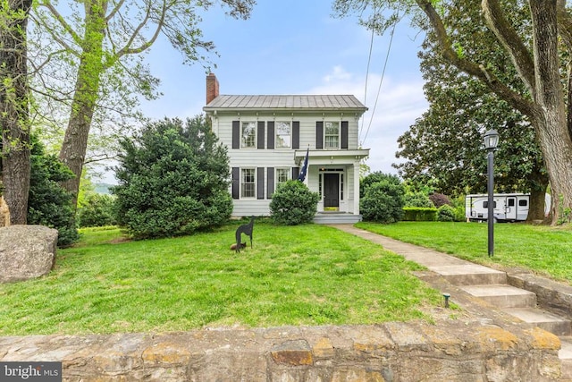 view of front of home with a front yard