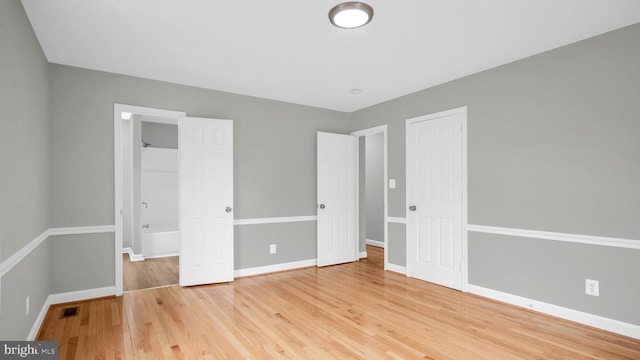 unfurnished bedroom featuring light hardwood / wood-style flooring