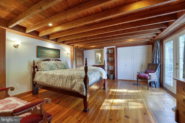 bedroom with beamed ceiling, french doors, light hardwood / wood-style floors, and wooden ceiling