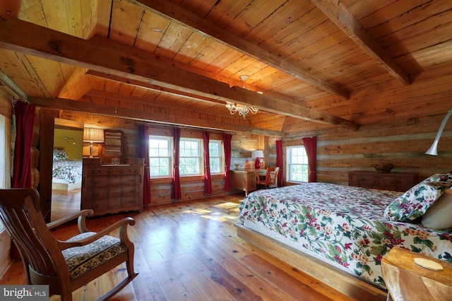 bedroom with beam ceiling, wooden ceiling, a notable chandelier, wood walls, and hardwood / wood-style flooring