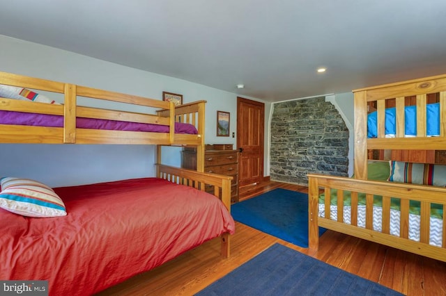 bedroom featuring hardwood / wood-style floors