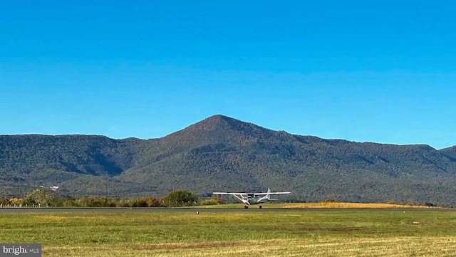 view of mountain feature featuring a rural view