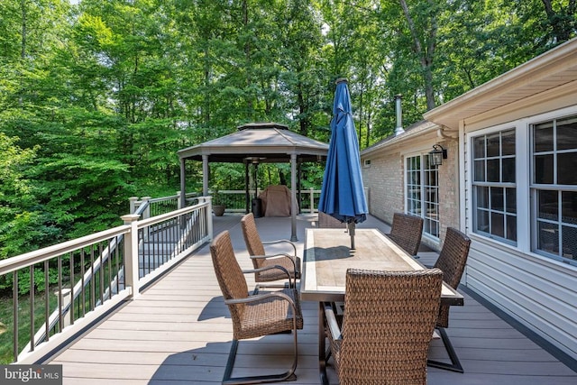 wooden deck featuring a gazebo